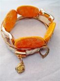 Conjunto de Pulseiras Douradas e Pedras Amarelas